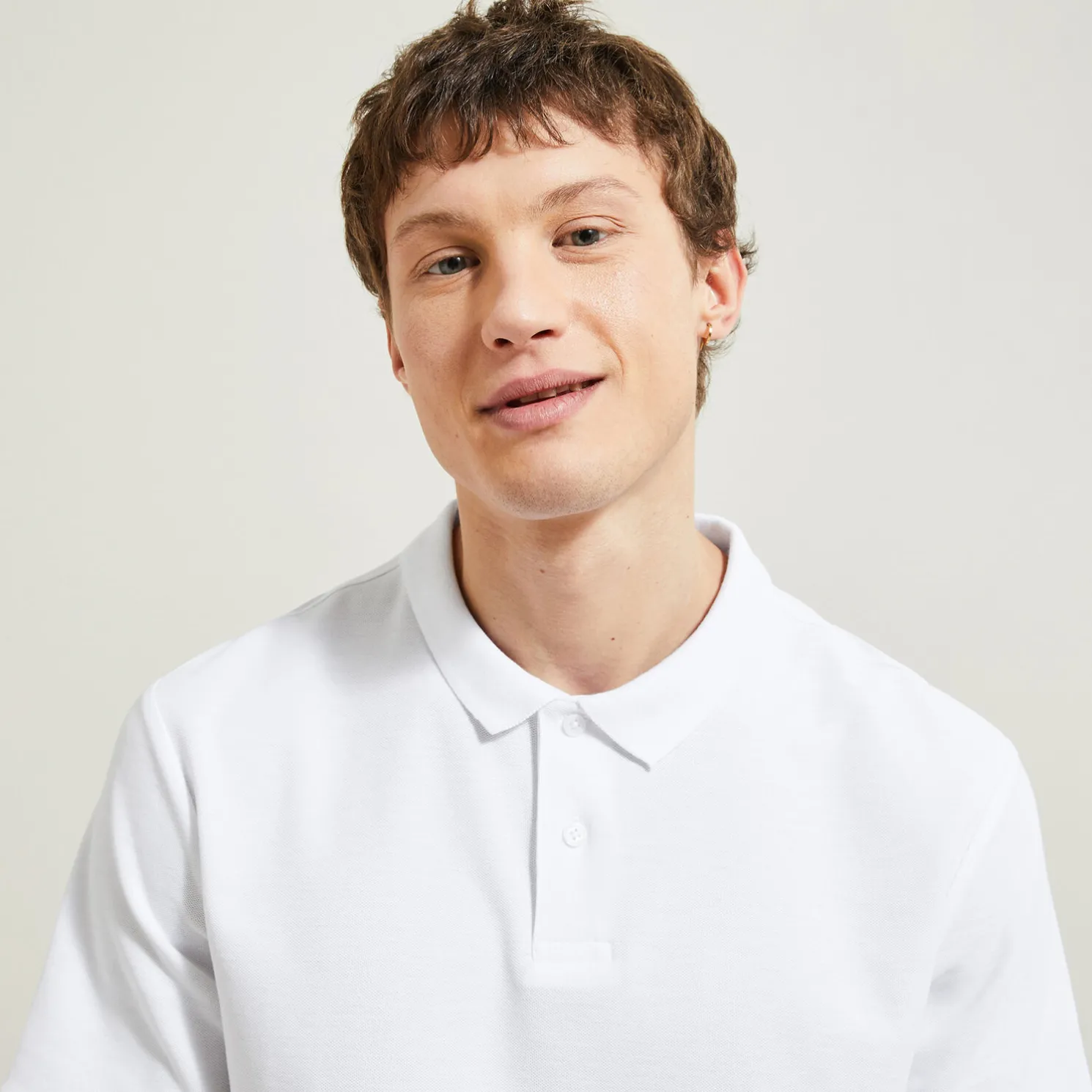 Effen polo in piquékatoen met korte mouwen