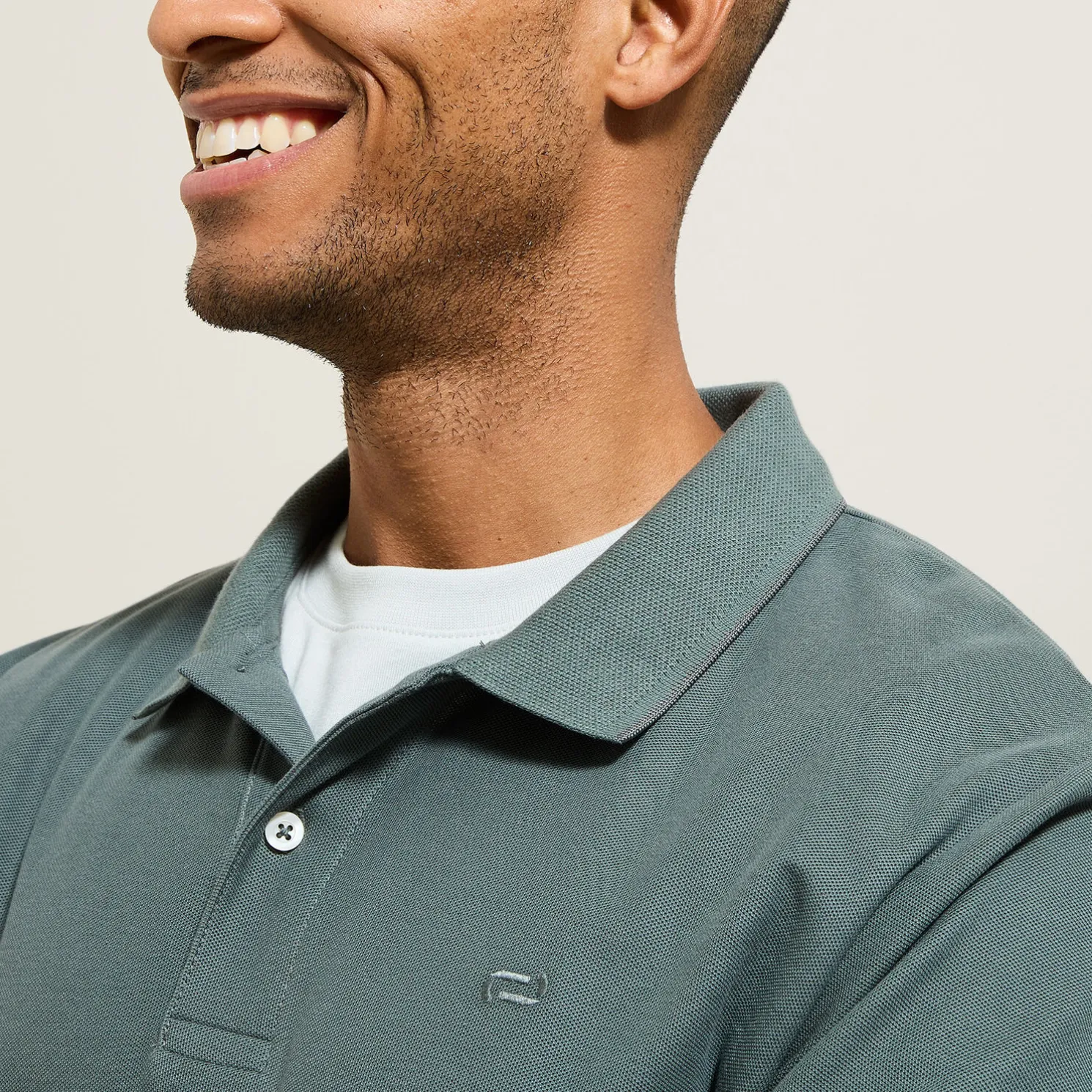 Effen polo in piquékatoen, met lange mouwen