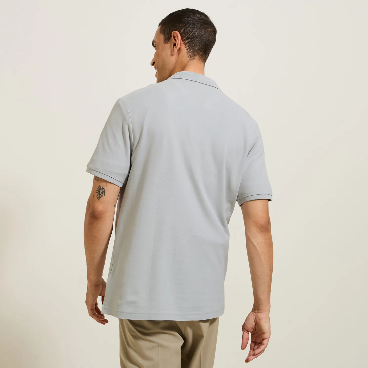 Effen polo in piquékatoen met korte mouwen