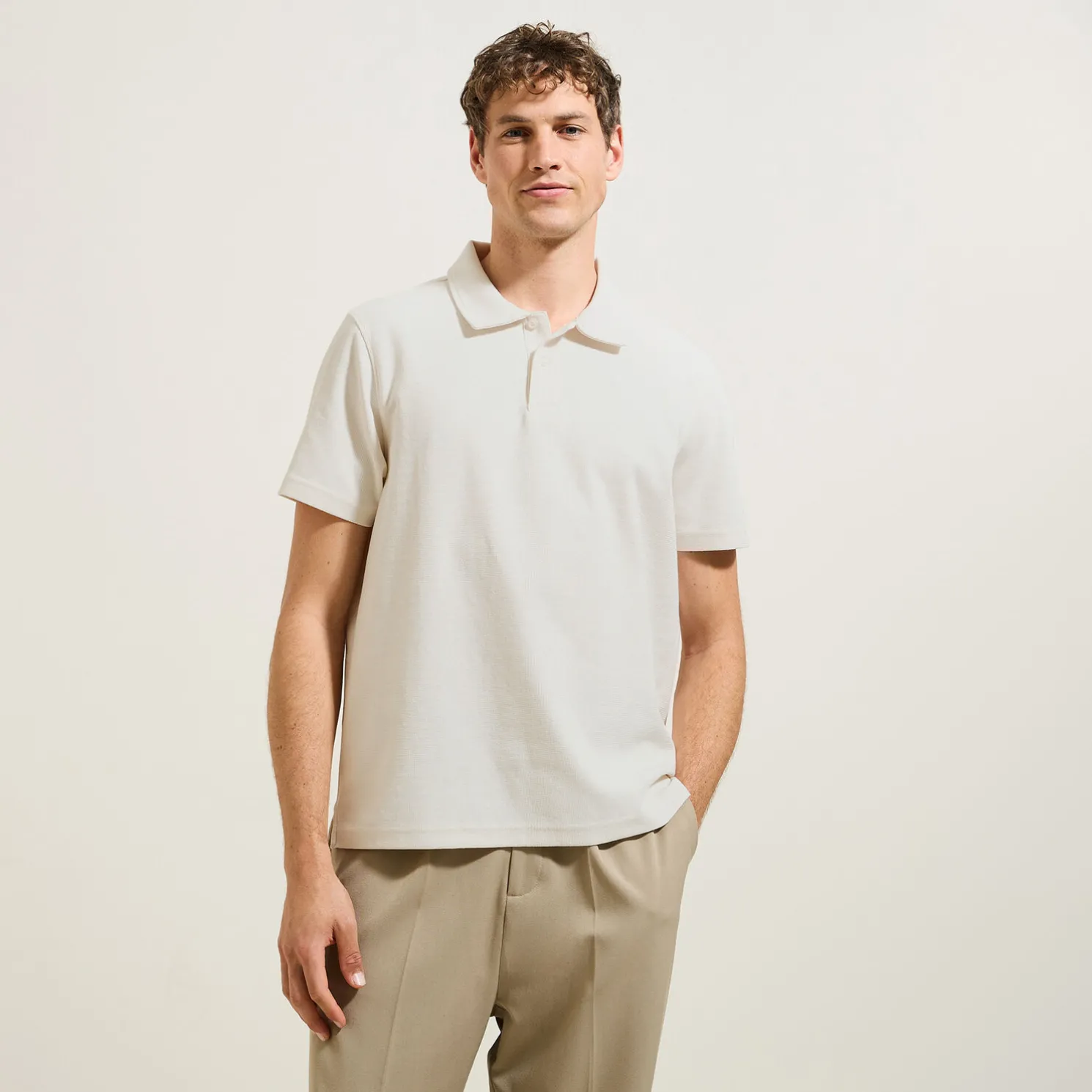 Effen relaxed polo met korte mouwen in textuurstof