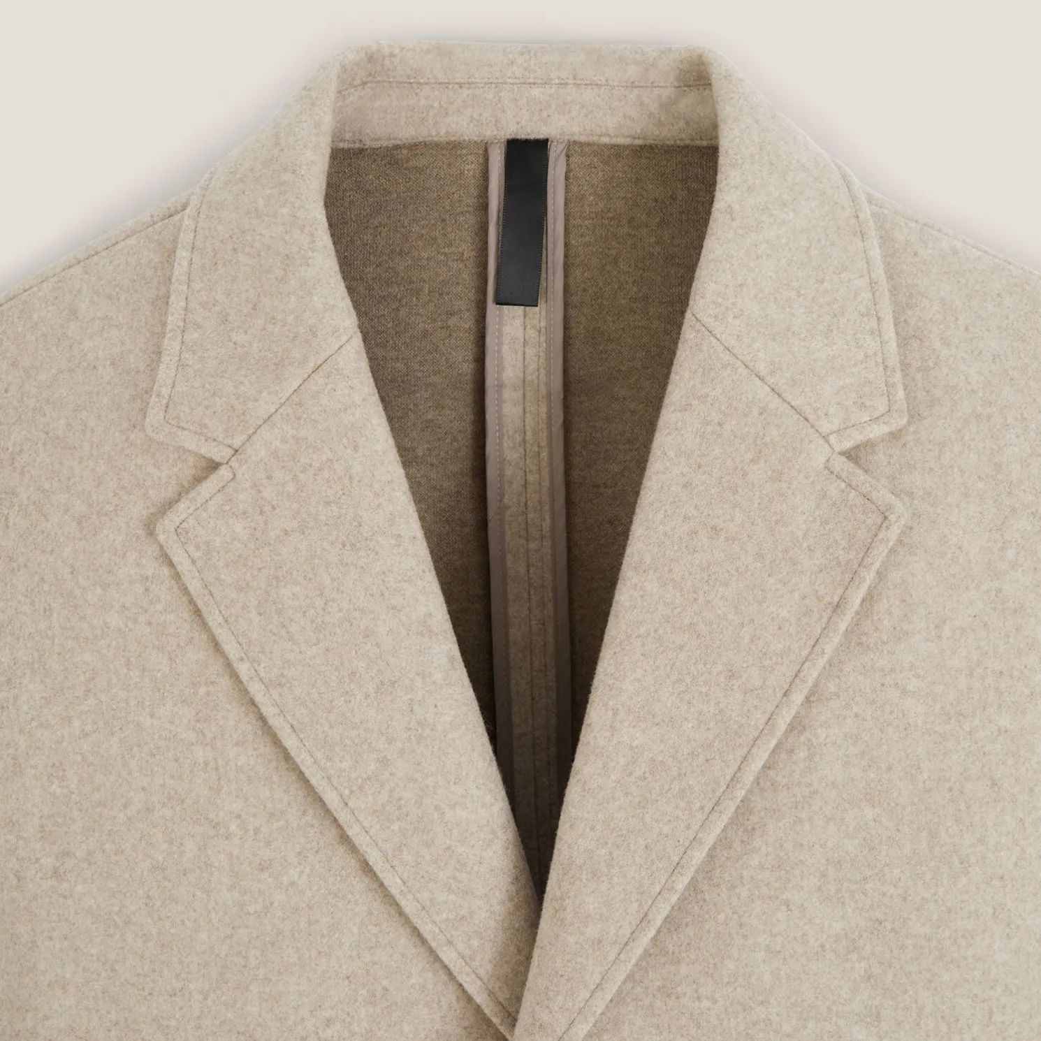 Lange wintermantel met reverskraag