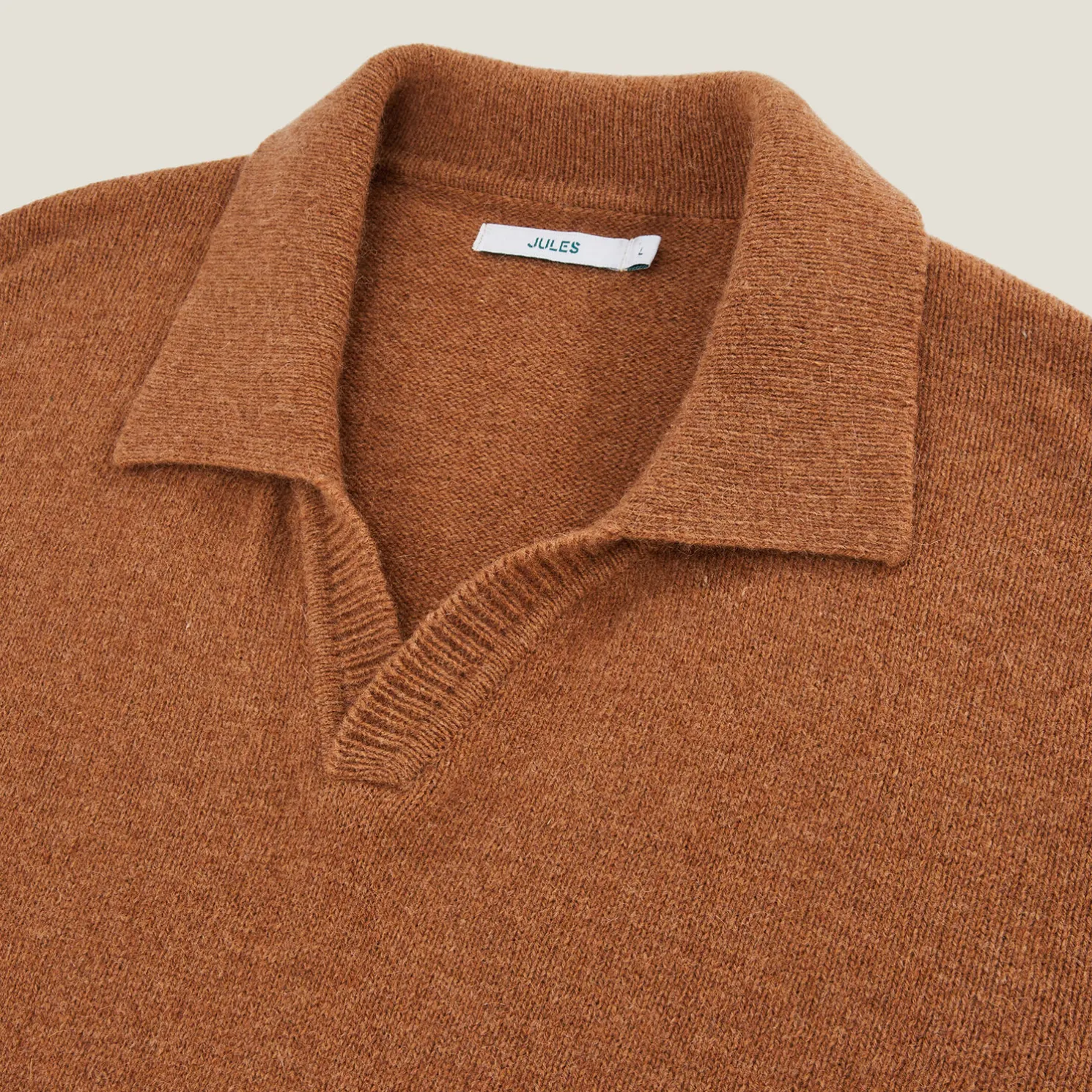 Polo in tricot met resortkraag