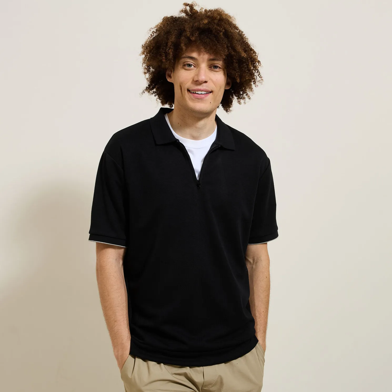 Relax polo in textuurstof met korte mouwen en polo