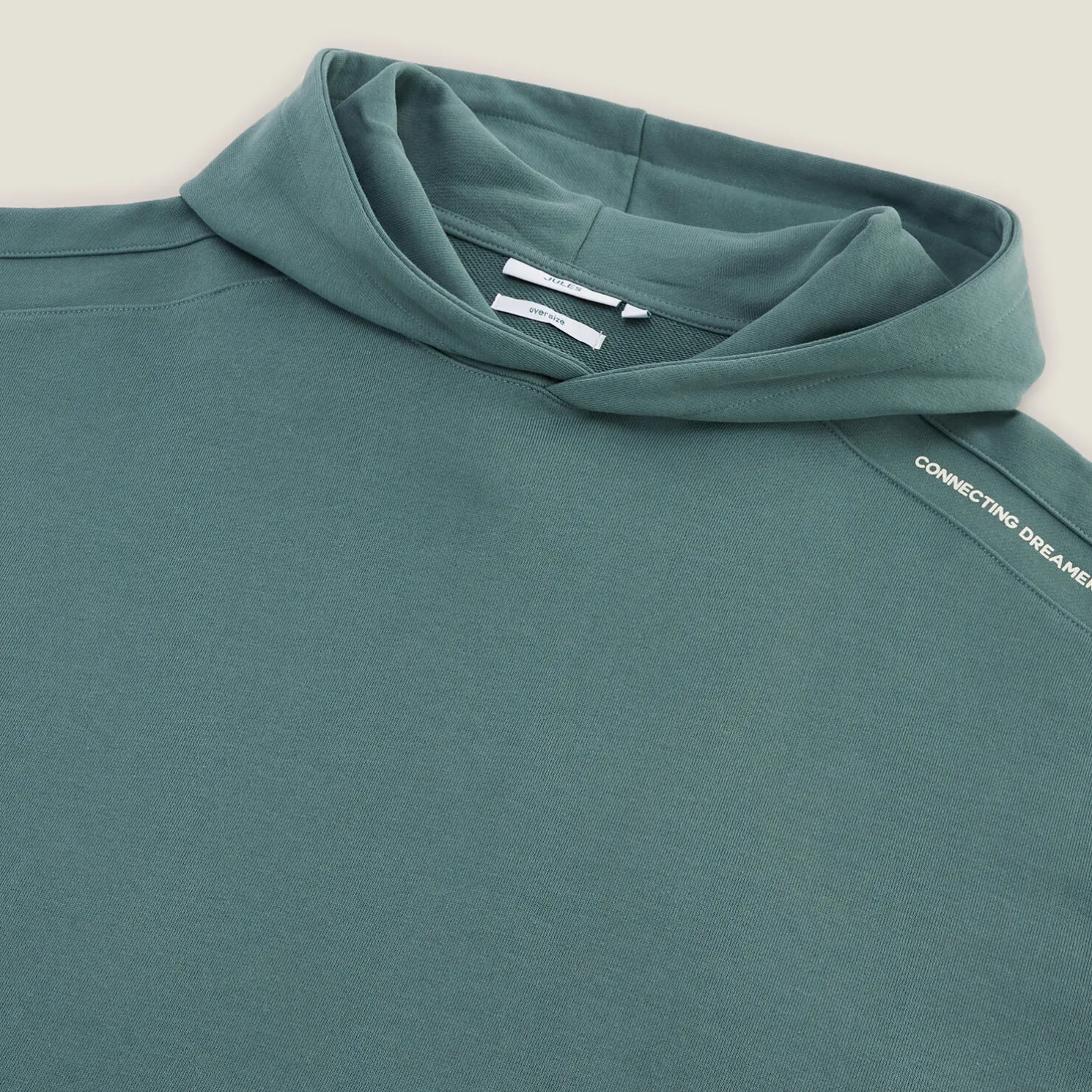 Sweater met kap, oversize snit en print op de kap