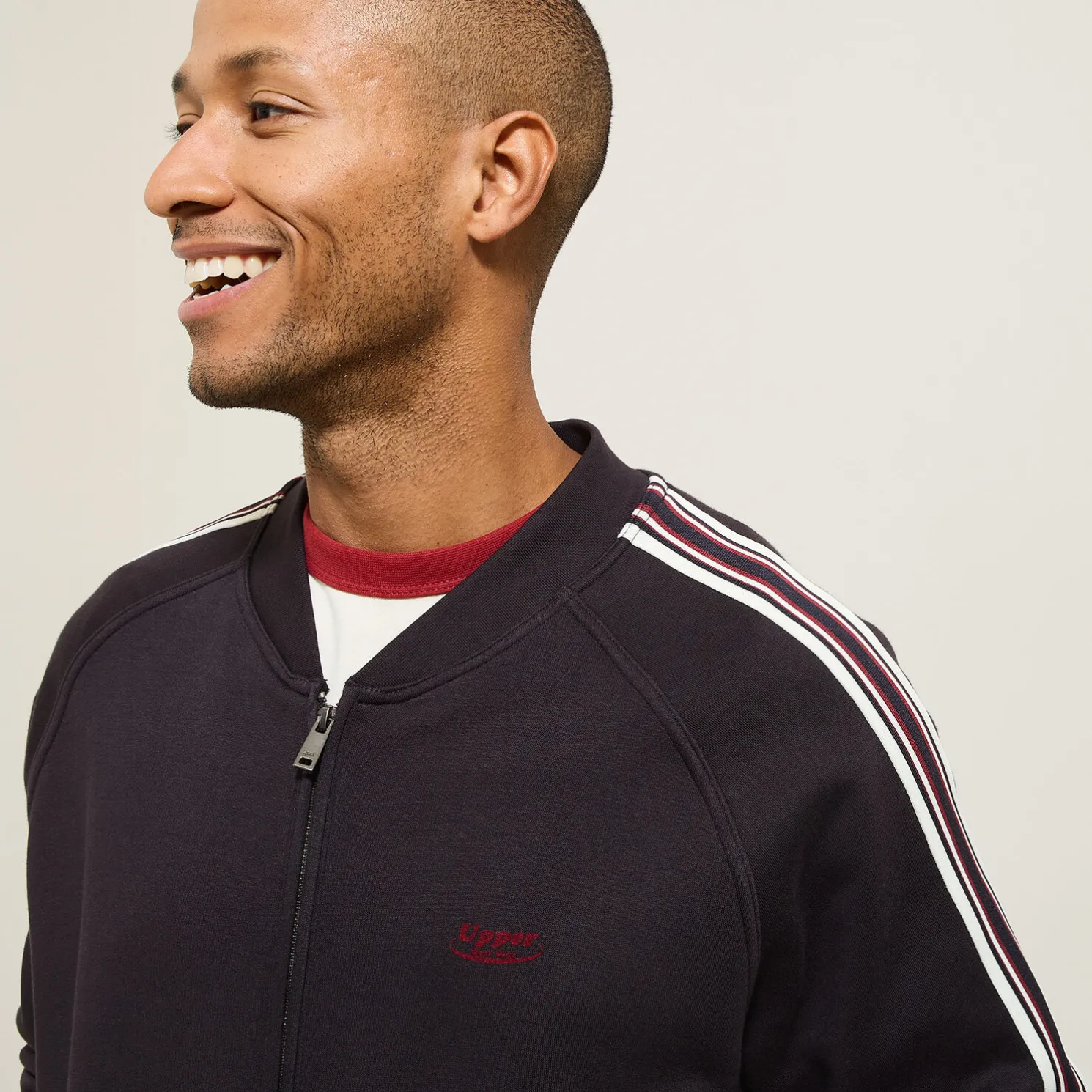 Sweater met rits en mouwstrepen