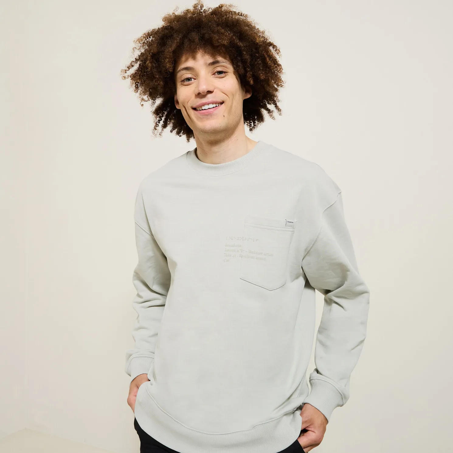 Sweater ronde hals, zak en afbeelding