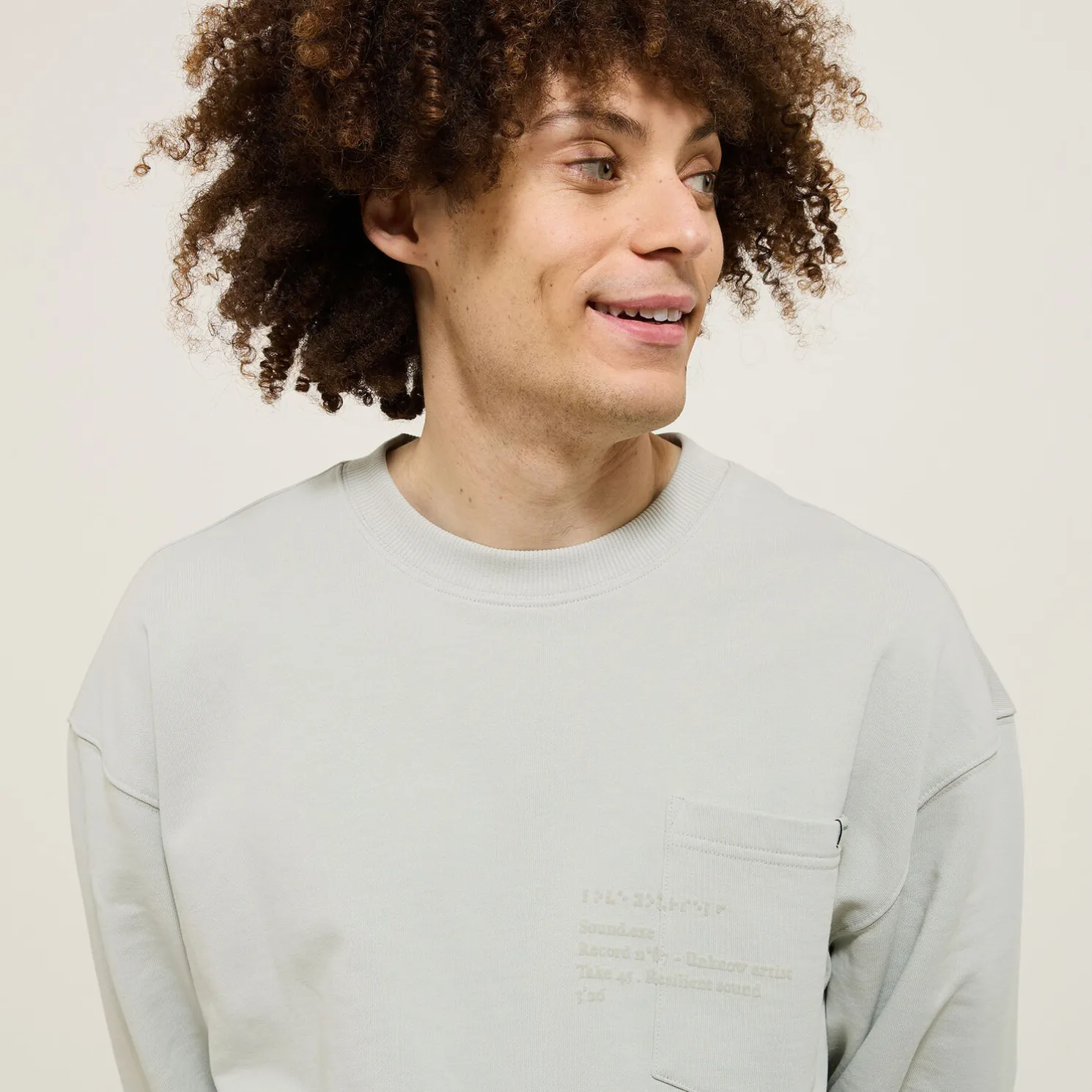 Sweater ronde hals, zak en afbeelding