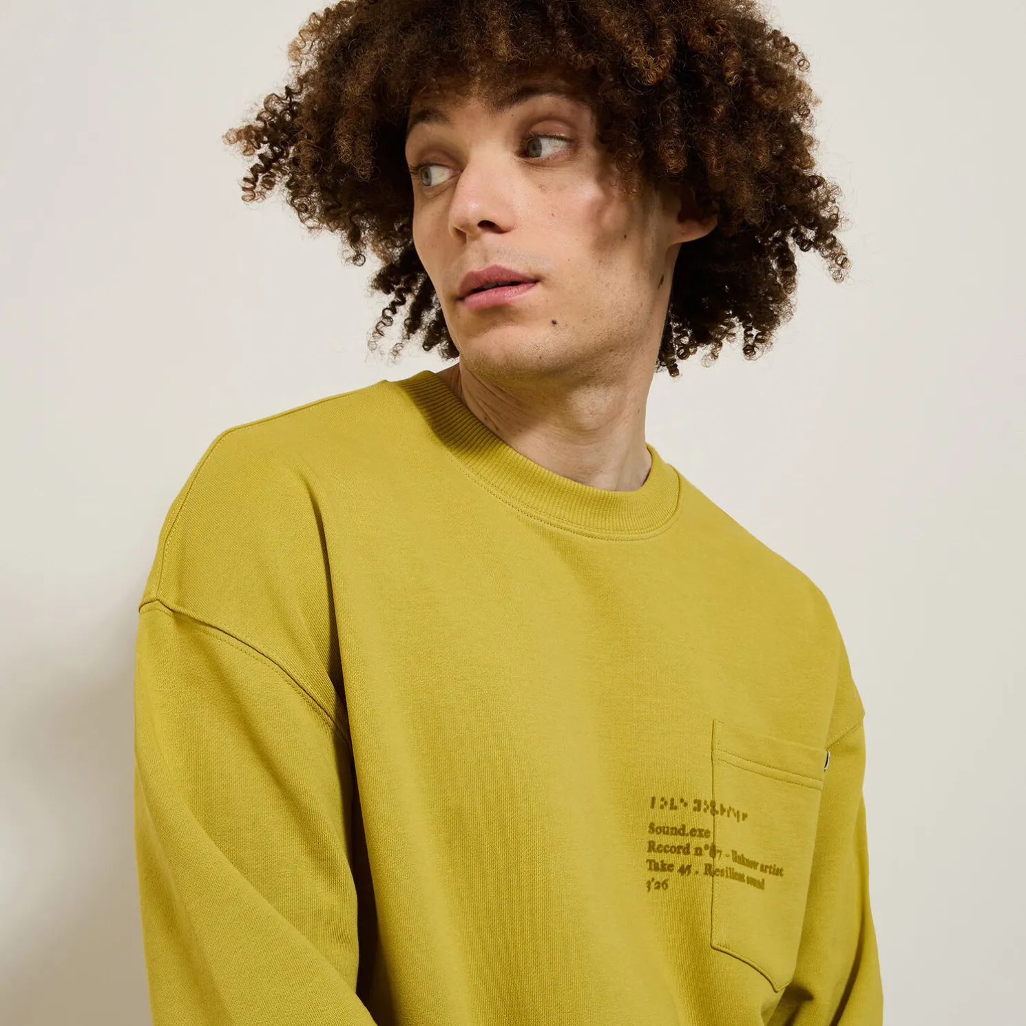 Sweater ronde hals, zak en afbeelding