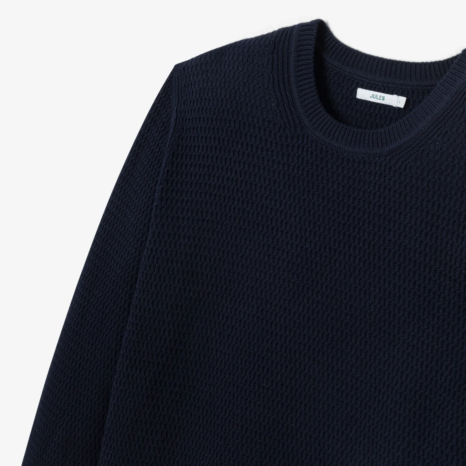 Trui met ronde hals en reliëfsteken