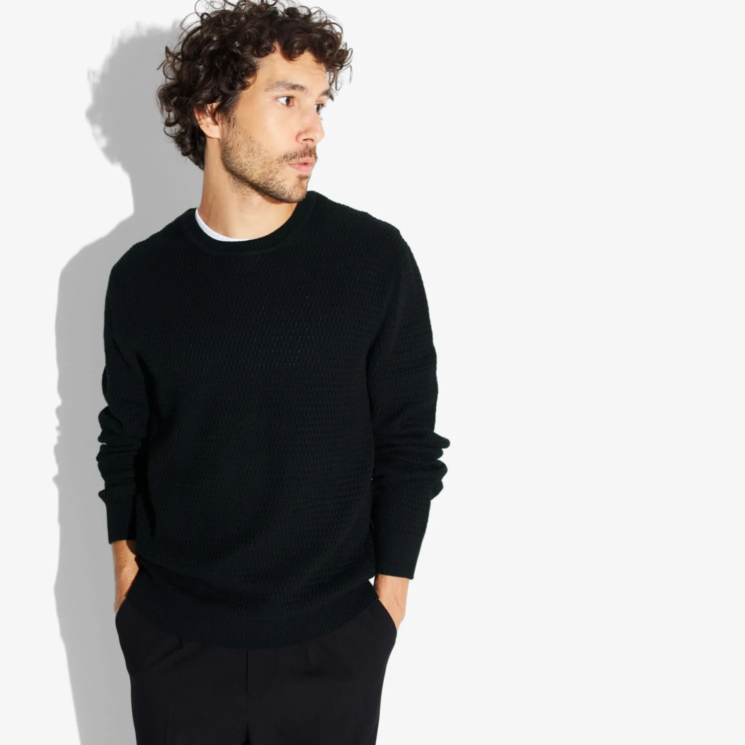 Trui met ronde hals en reliëfsteken