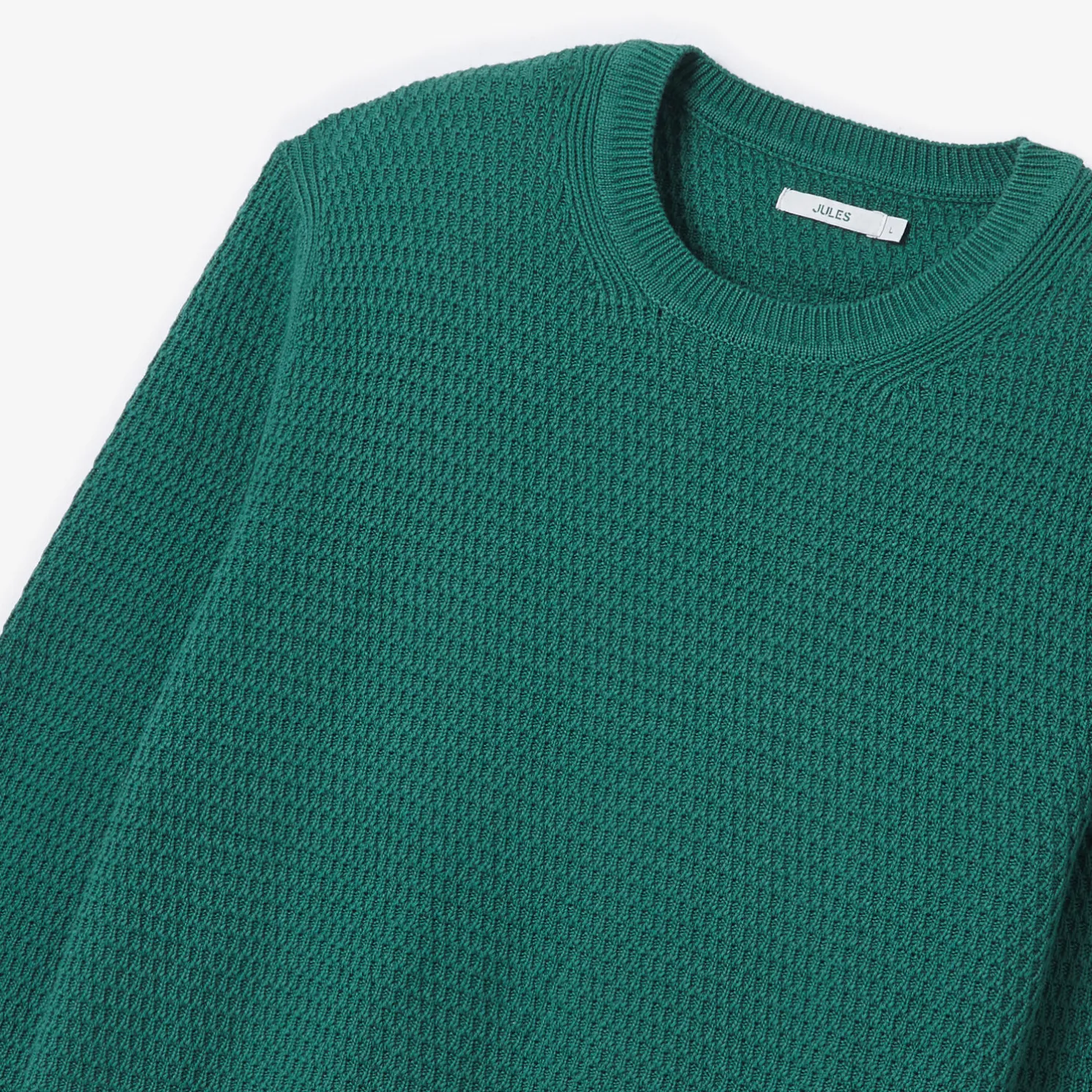 Trui met ronde hals en reliëfsteken