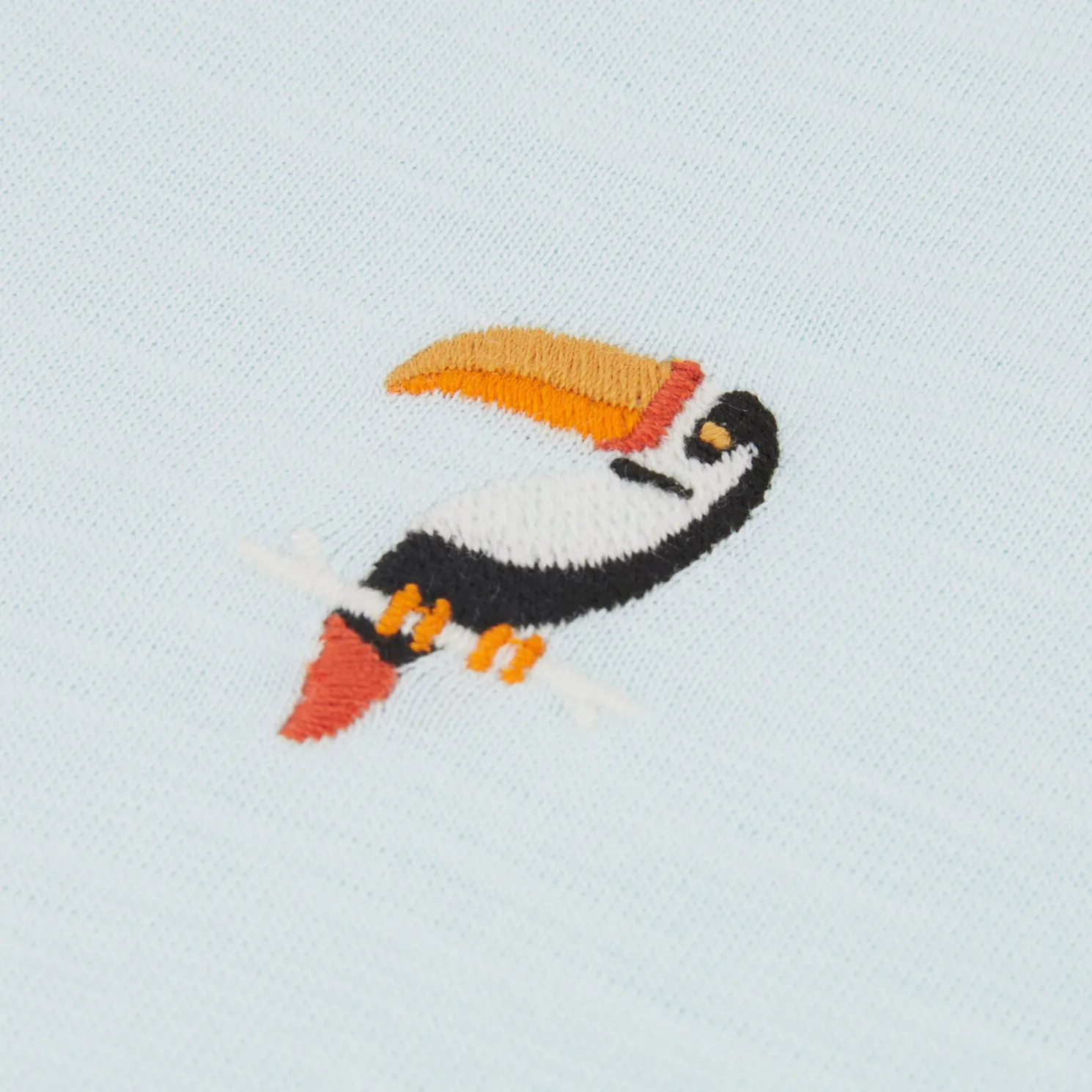 T-shirt in gevlamde stof met borduursel op de bors