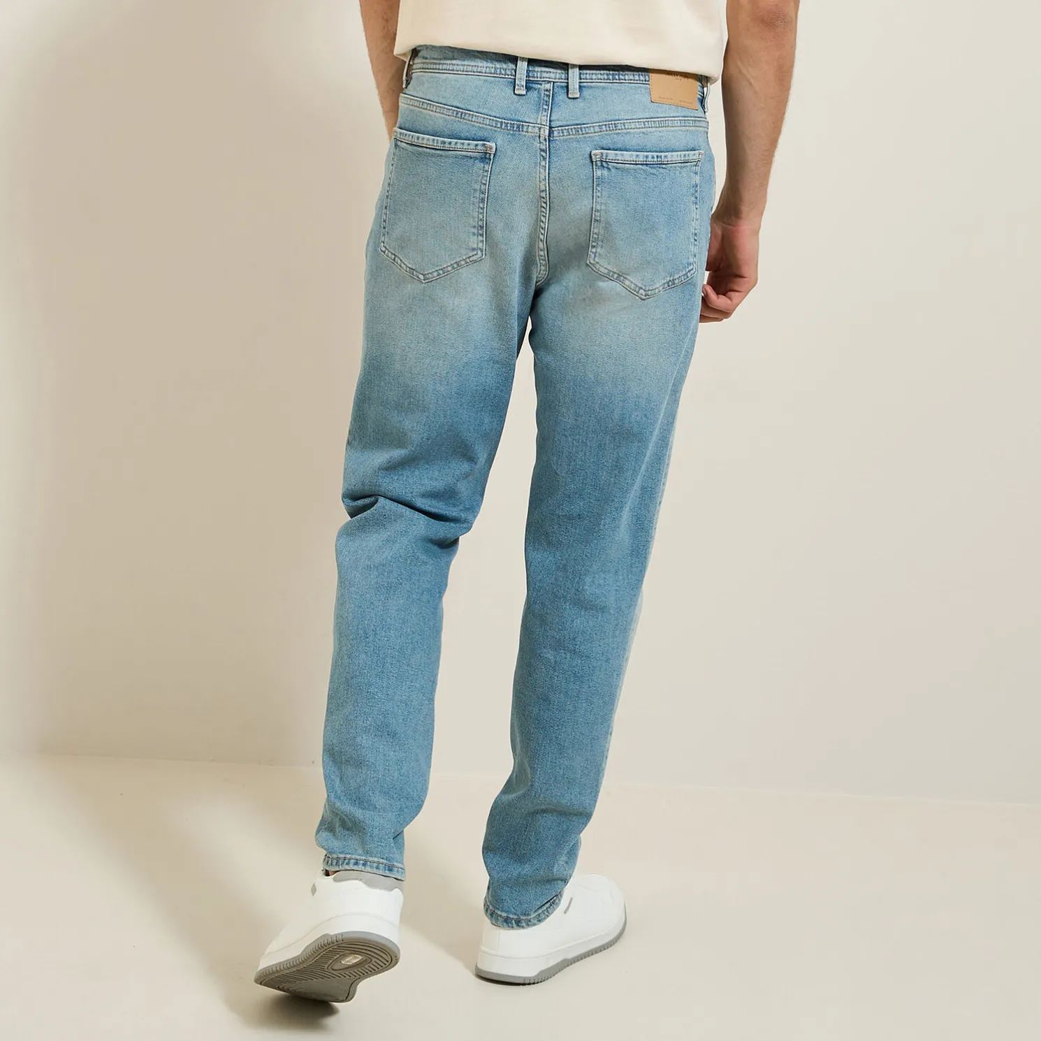 Washed tapered jeans