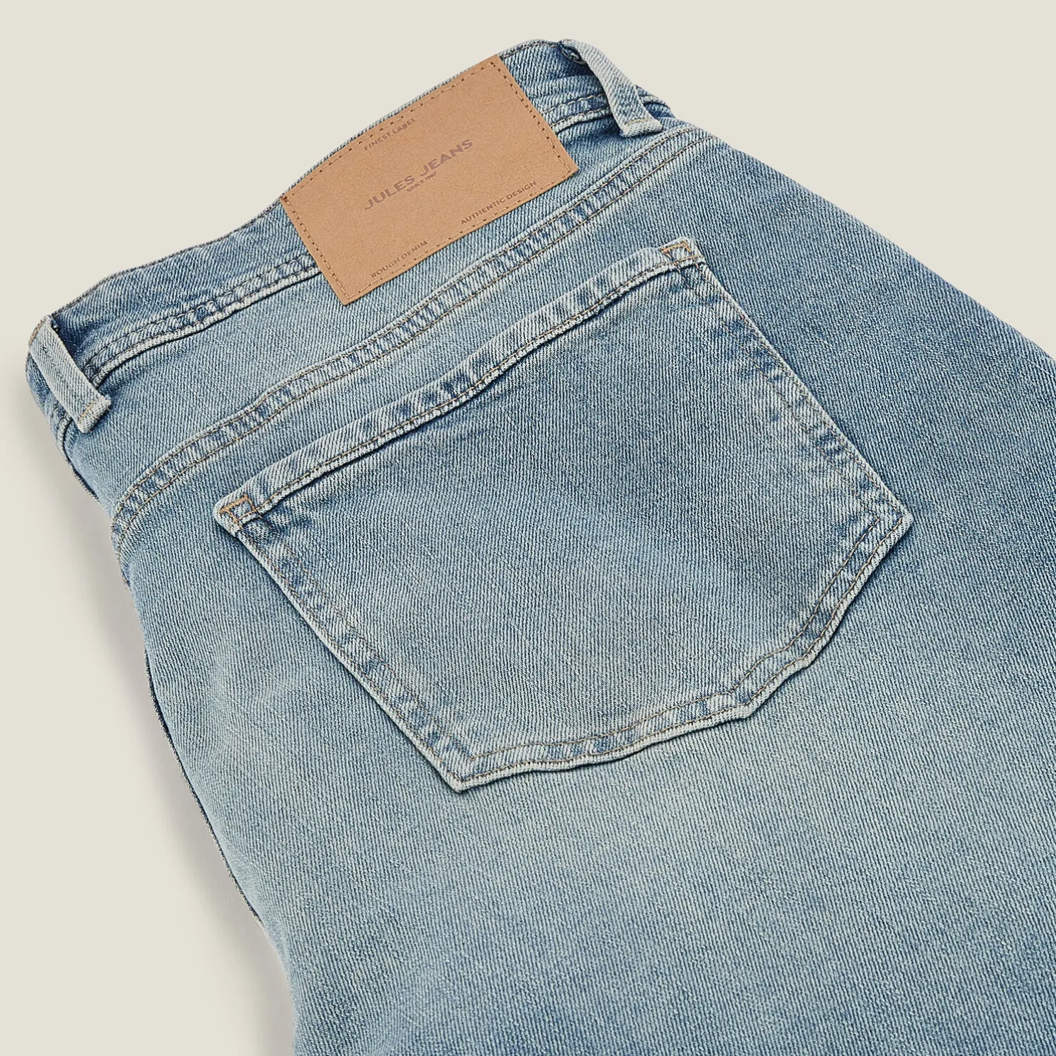 Washed tapered jeans